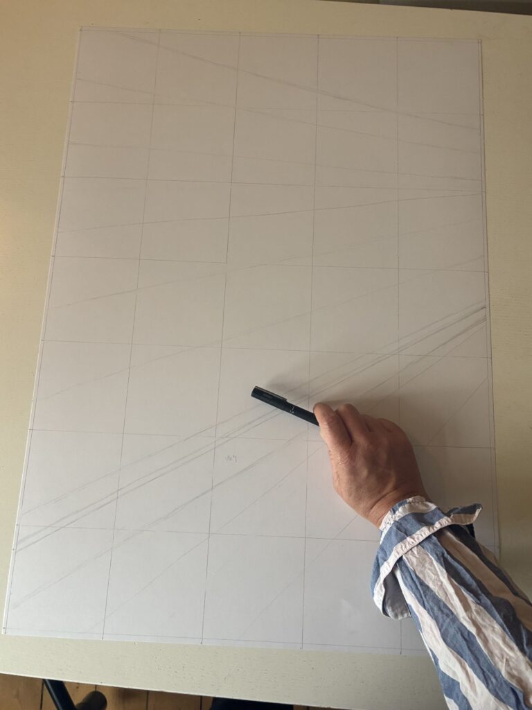 Artist Bodil Greiner creating a custom fineliner drawing by hand using professional fineliner pens.
