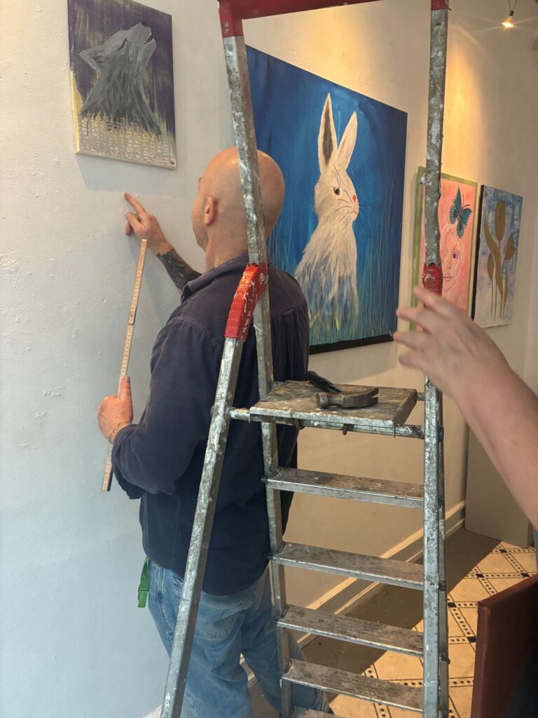 Installing artwork for an exhibition at Lowlands Gallery, Copenhagen.