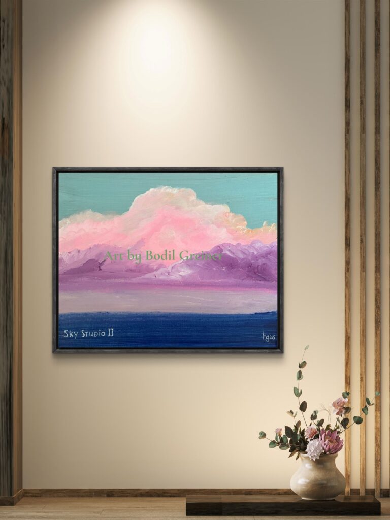 Original acrylic landscape painting “Sky Studio II – Dreamlight” by Bodil Greiner with glowing pink clouds, violet mountains, and peaceful blue water in a contemporary interior.